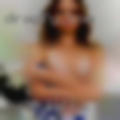 Nude girl in bed